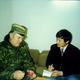 Hu interviews former Bosnian Serb military leader Ratko Mladić, who is later charged with genocide, in 1994.